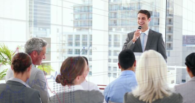 Businessman Giving Presentation to Colleagues in Modern Office - Download Free Stock Images Pikwizard.com