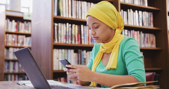 Student Studying in Library and Using Smartphone - Download Free Stock Images Pikwizard.com