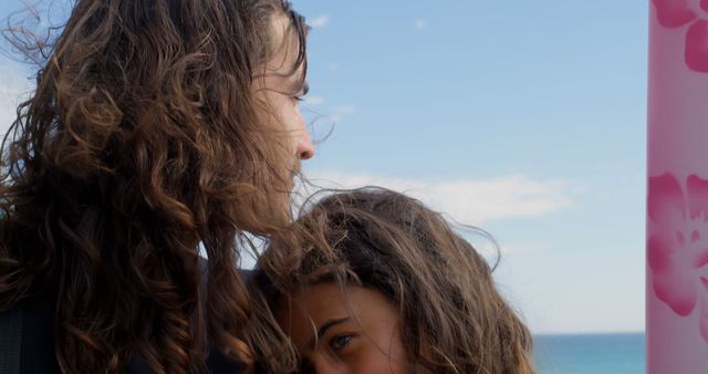 Mother and Daughter Holding Each Other by Beach - Download Free Stock Images Pikwizard.com