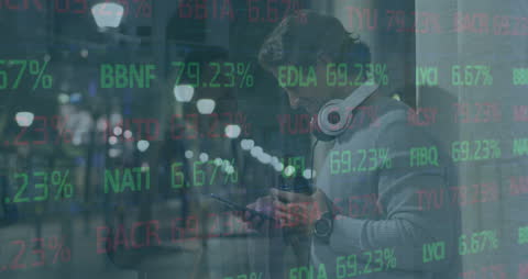 Man Engaged with Financial Data on Smartphone