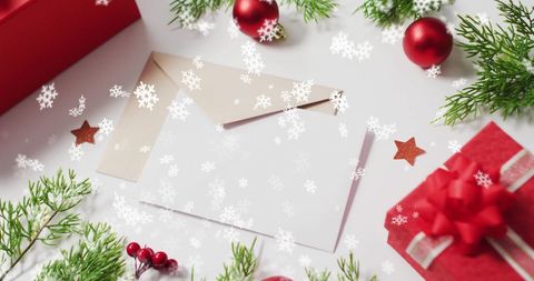 Festive Christmas Envelopes Amidst Holiday Decorations - Download Free Stock Images Pikwizard.com
