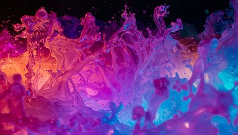 Vibrant Multicolored Liquid Splash Forming Sculptural Peaks with Neon Gradient Lighting