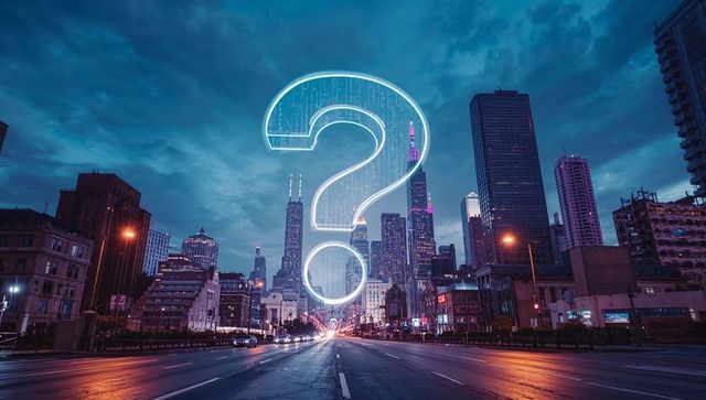 Neon Question Mark Above Urban Avenue at Night