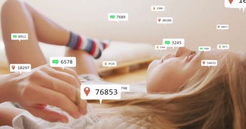 Connected lifestyle: young woman engaging with digital notifications