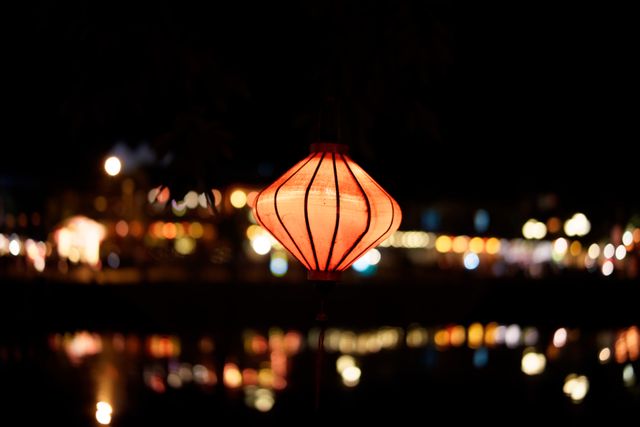 Illuminated Red Lantern Hanging at Night - Download Free Stock Photos Pikwizard.com