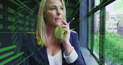 Businesswoman Analyzing Data with Futuristic Technology Interface