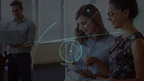 Colleagues Collaborating with Digital Technology in Modern Office