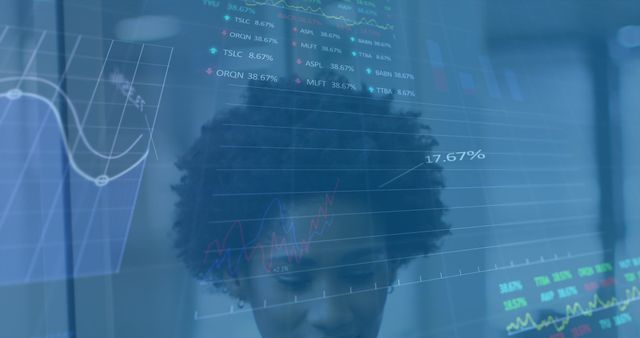 African American Businesswoman Analyzing Finance Data with Digital Graph Overlays - Download Free Stock Images Pikwizard.com