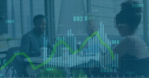 Diverse team analyzing financial graphs in casual meeting