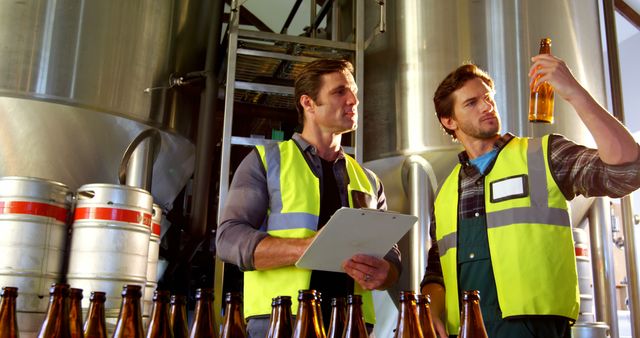 Quality Control Inspectors in Brewery Analyzing Beer Bottles - Download Free Stock Images Pikwizard.com