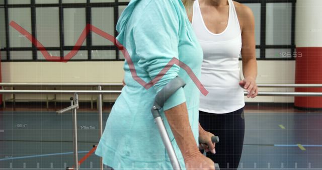 Senior undergoing rehabilitation therapy assisted by a professional in an indoor facility. Useful for topics on healthcare, elderly care, physical therapy, rehabilitation centers, and supportive environment for senior citizens.