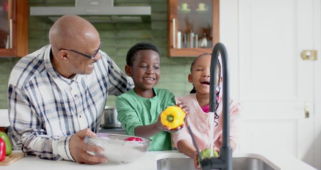 Happy Grandfather Cooking with Grandchildren in Modern Kitchen - Download Free Stock Images Pikwizard.com