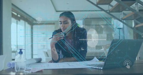 Architect Analyzing Blueprints with Futuristic Technological Interface