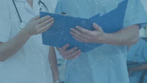Doctors Analyzing Data with Digital Network Concept