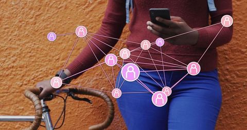 Woman Connecting Data and Mobility with Smartphone and Bicycle