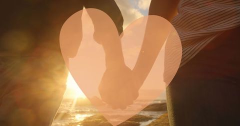 Silhouette of Couple Holding Hands at Sunset - Download Free Stock Images Pikwizard.com