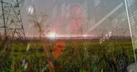 Futuristic Renewable Technology Overlay on Sunset Landscape