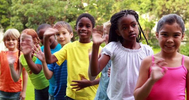 Happy Diverse Children Waving Hands in Outdoor Park - Download Free Stock Images Pikwizard.com