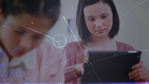 Focused Students Engaging with Digital Tablets in Classroom