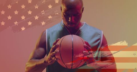 Focused Basketball Player Holding Ball with American Flag Overlay