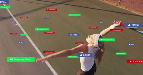 Athletic woman training with dumbbells on tennis court with social notifications