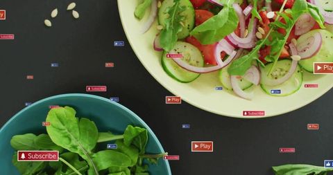 Overhead flatlay mixing fresh cucumber, tomato, arugula salads with social media buttons