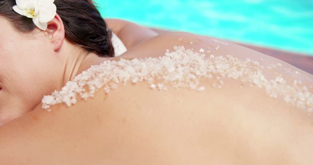 Woman Enjoying Relaxing Salt Scrub by Poolside - Download Free Stock Images Pikwizard.com