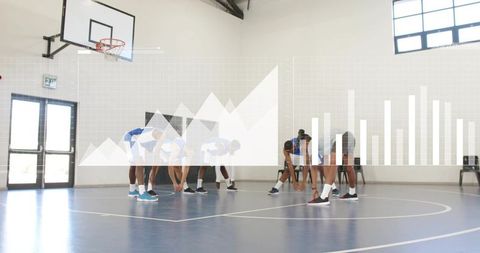 Basketball team stretching on indoor court with performance charts and analytics overlay