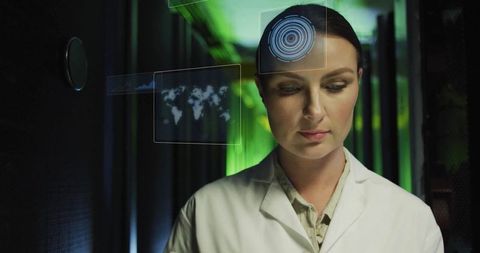 Female IT Engineer Analyzing Holographic Displays in Server Room