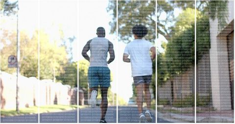 Two men jogging on sunlit park path with binary code overlay digital fitness concept