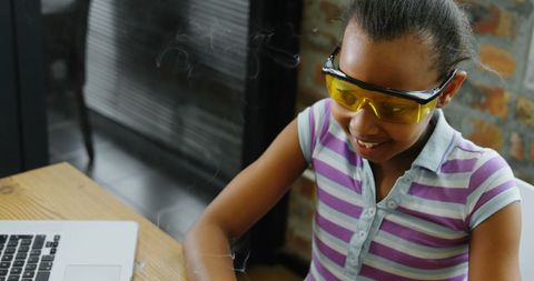 teenage girl soldering electronics in modern workspace - Download Free Stock Images Pikwizard.com