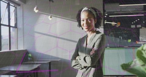 Confident Businesswoman in Modern Workspace with Digital Overlay