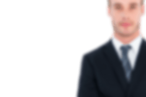 Defocused Transparent Businessman in Suit Against Blank Background - Download Free Stock Videos Pikwizard.com