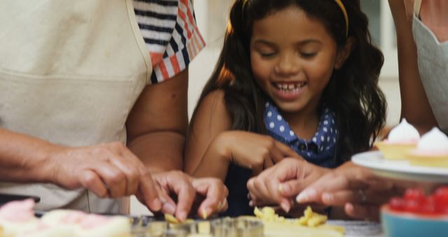 Excited Child Baking with Family in Kitchen - Download Free Stock Images Pikwizard.com