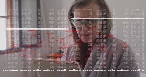 Professional woman analyzing code on laptop with wireframe and data overlay, natural light