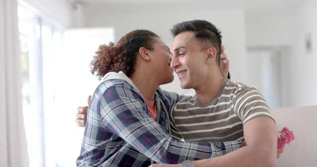 Happy couple having tender moment in bright living room - Download Free Stock Images Pikwizard.com