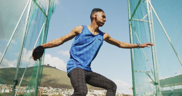 Athlete Preparing to Throw Discus in Outdoor Field - Download Free Stock Images Pikwizard.com