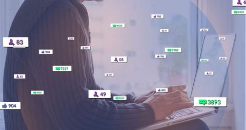 Business Professional Engaging on Social Media With Laptop