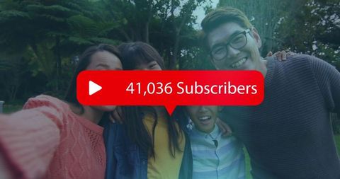 Smiling family taking selfie with 41,036 subscribers notification overlay in green park