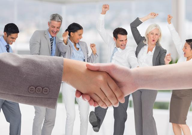 Business executives shaking hands while colleagues cheer in the background. Ideal for illustrating successful business deals, teamwork, corporate achievements, and professional partnerships. Suitable for use in business presentations, corporate websites, and marketing materials.