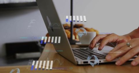 Woman typing on laptop with holographic analytics overlay at modern minimalist workspace
