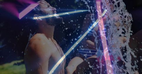 Bearded shirtless man catching pool water with neon light double-exposure vibe