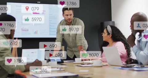 Team Analyzing Social Media Metrics for Effective Strategy