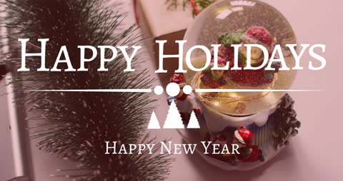 Festive Greeting with Snow Globe and Holiday Decorations