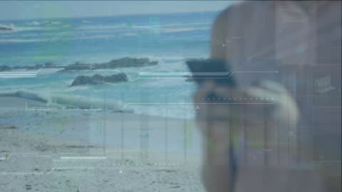 Guy Checking Financial Data on Smartphone by Ocean