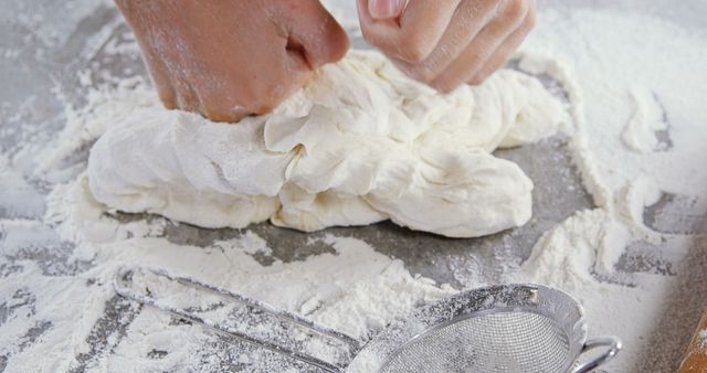 Close-up of Hands Kneading Dough on Floured Surface - Download Free Stock Images Pikwizard.com