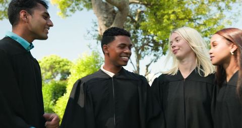 Diverse Group of Graduates Celebrating Outdoor Achievement