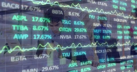 Analysts Collaborating with Stock Market Data Overlay