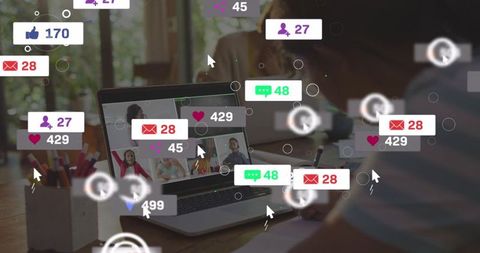 Displaying laptop video grid with floating social reaction overlays during remote learning