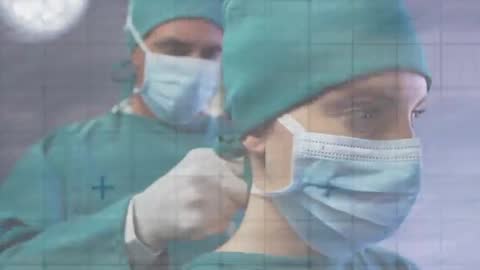Surgeons Collaborating in Operating Room with High-Tech Interface